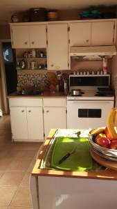 To me, this kitchen almost looks charming. But! Single sink. Loose faucet. Oven of uselessness. Sticker backsplash. Nope. No. 